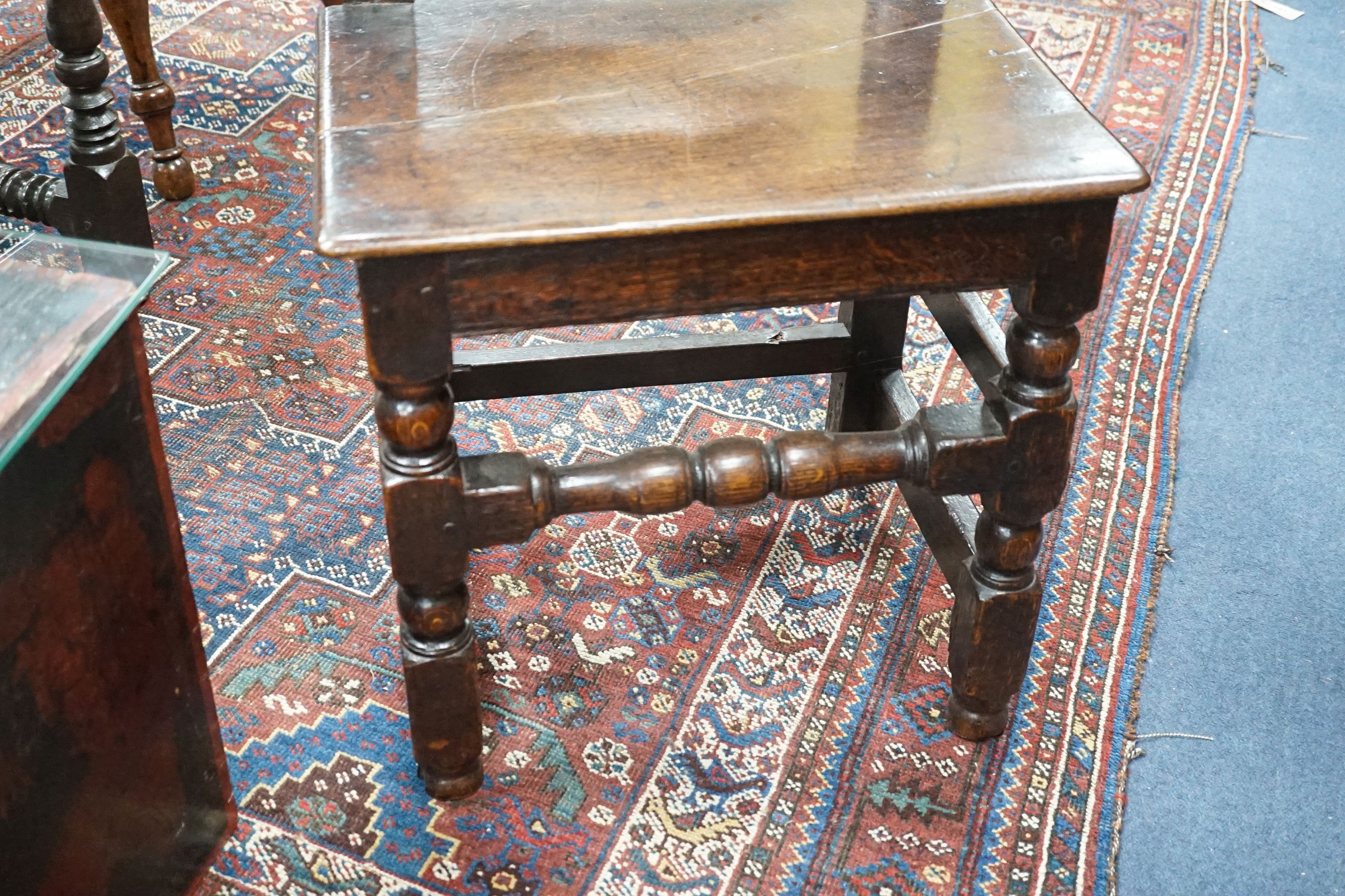 A 17th century Lancashire carved oak side chair, width 47cm, depth 36cm, height 104cm